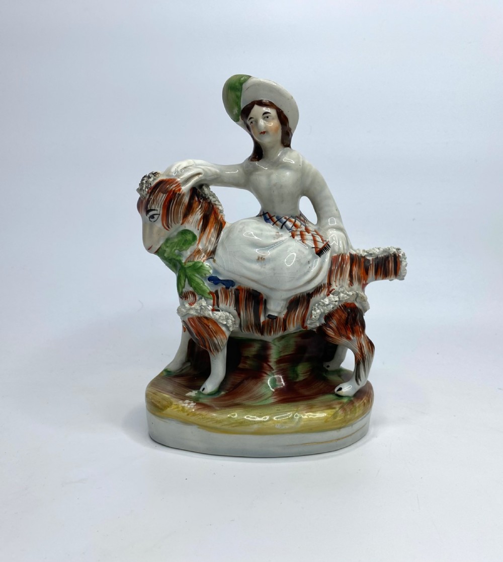 Pair Staffordshire Royal Children on goats, c. 1850. View VII