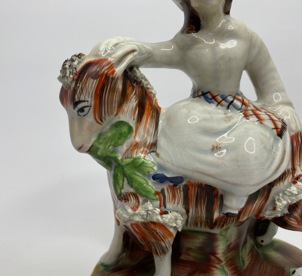 Pair Staffordshire Royal Children on goats, c. 1850. View VIII