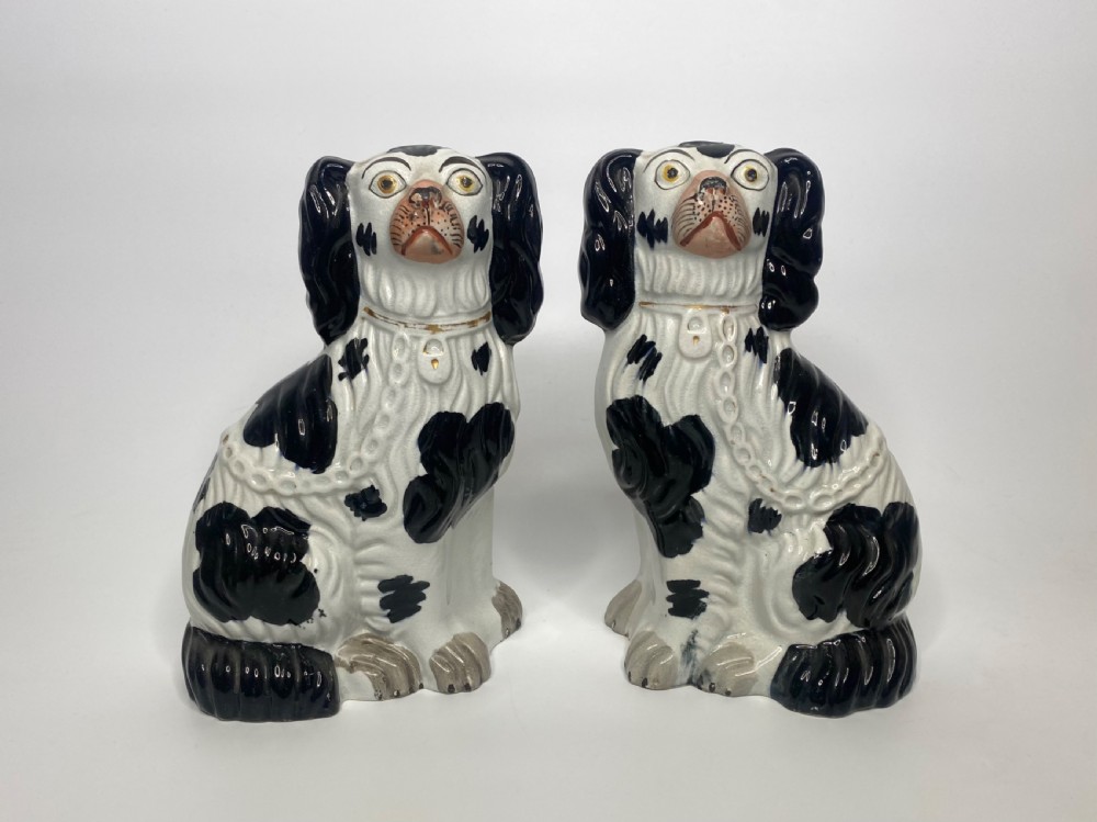 Pair Staffordshire pottery Spaniels, c. 1850.