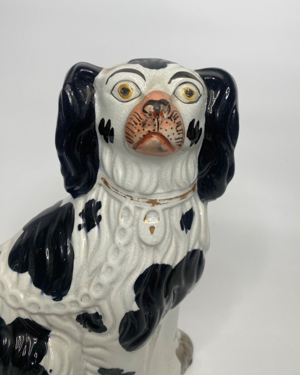 Pair Staffordshire pottery Spaniels, c. 1850. View III