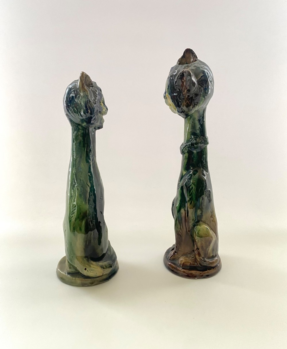 Pair Arts & Crafts pottery Cat candlesticks, c. 1910. View III