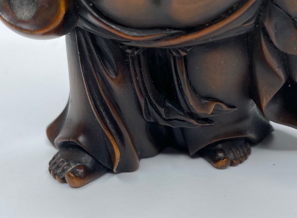 Hotei, a boxwood carved okimono, Meiji Period. View VIII