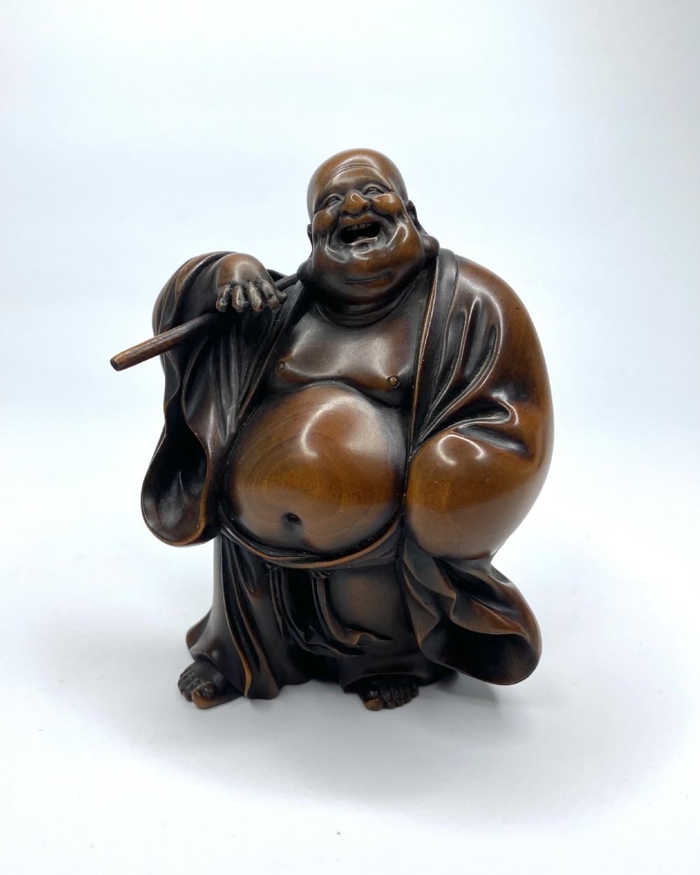 Hotei, a boxwood carved okimono, Meiji Period. View XI