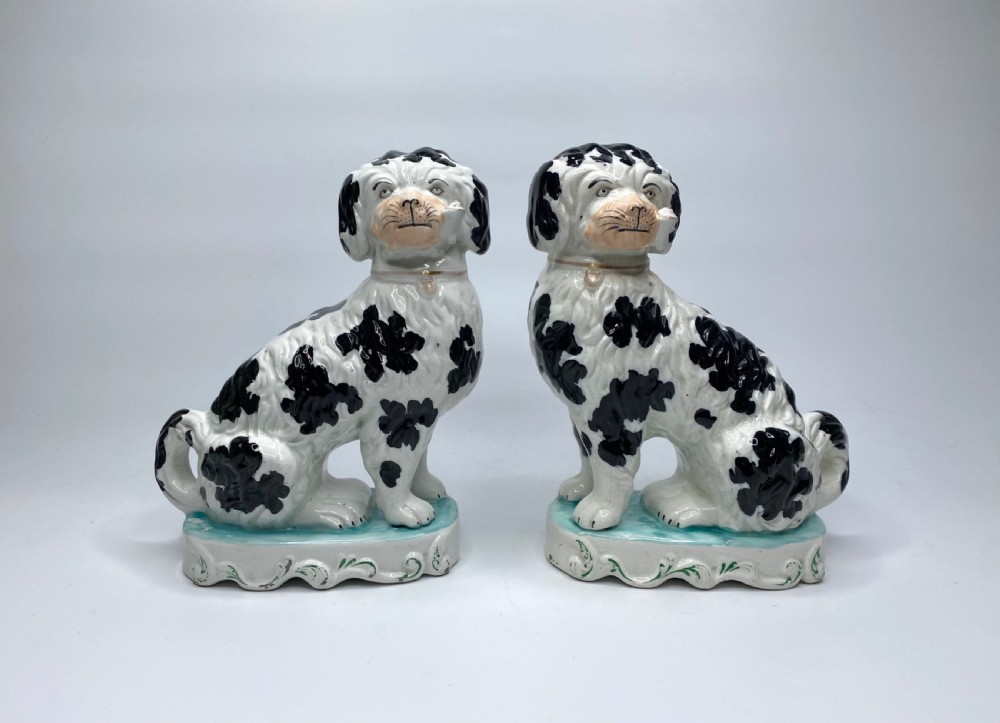 Pair Staffordshire Pipe Smoking dogs, c. 1850.