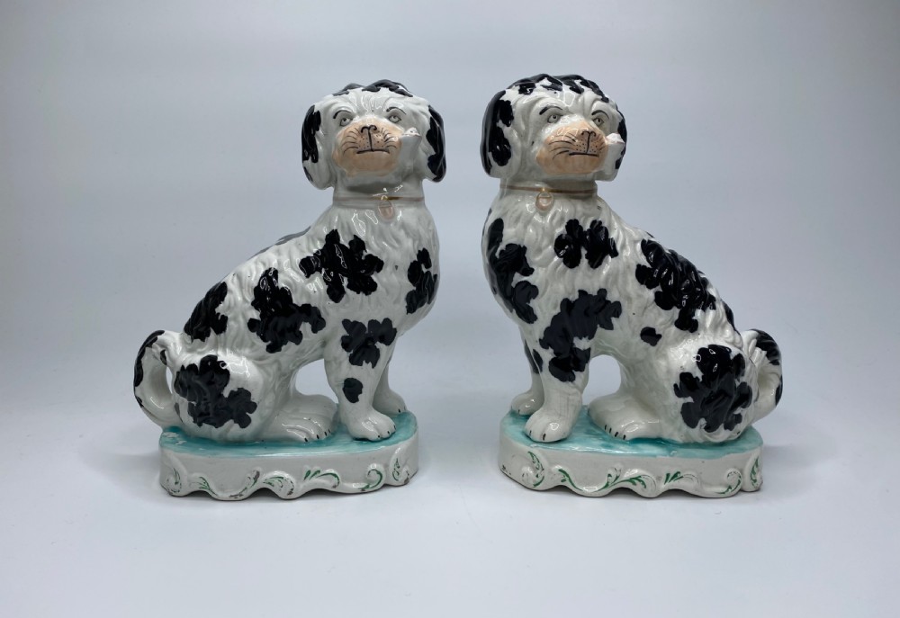 Pair Staffordshire Pipe Smoking dogs, c. 1850. View II