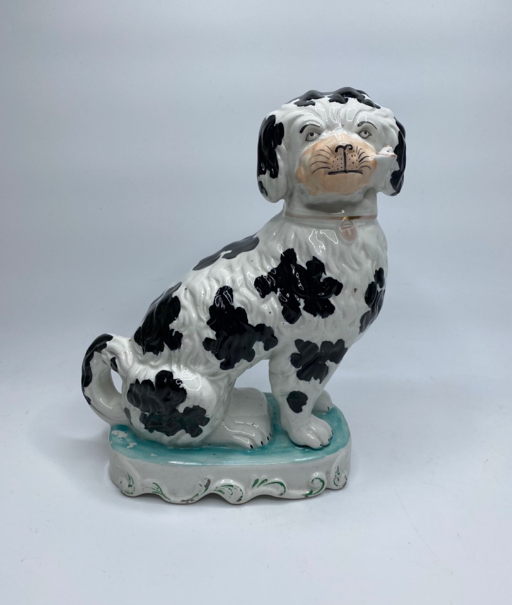 Pair Staffordshire Pipe Smoking dogs, c. 1850. View III