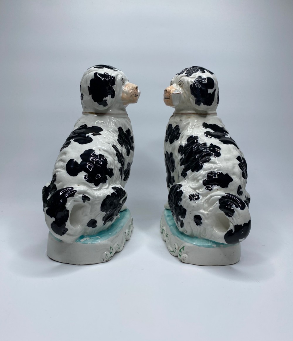 Pair Staffordshire Pipe Smoking dogs, c. 1850. View VII