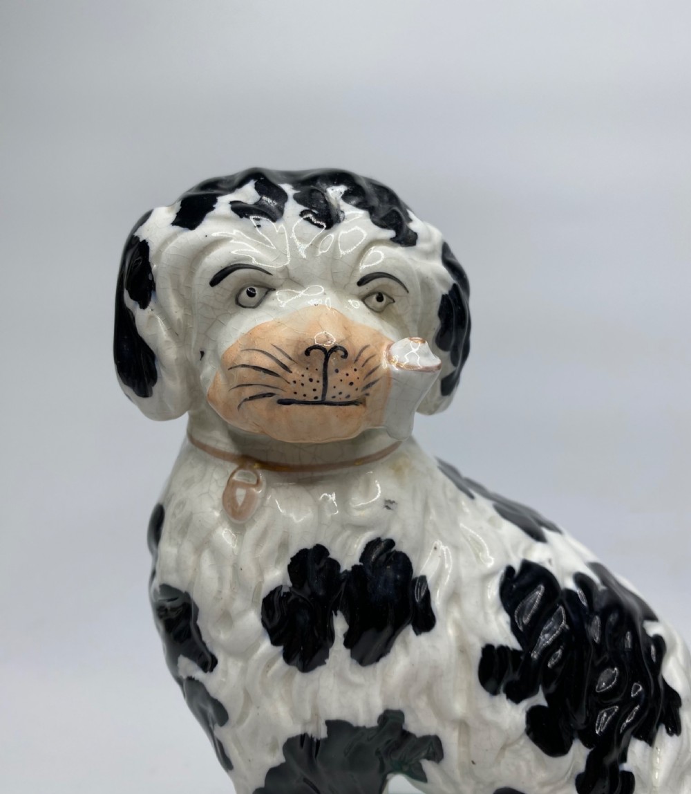 Pair Staffordshire Pipe Smoking dogs, c. 1850. View IX