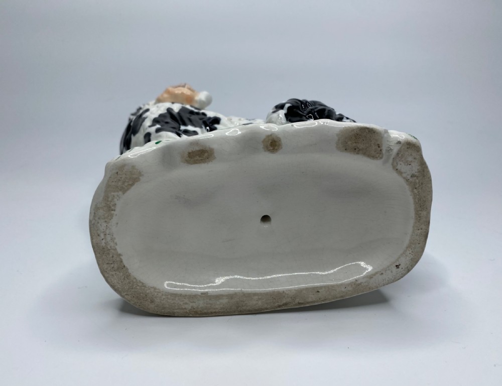 Pair Staffordshire Pipe Smoking dogs, c. 1850. View XII