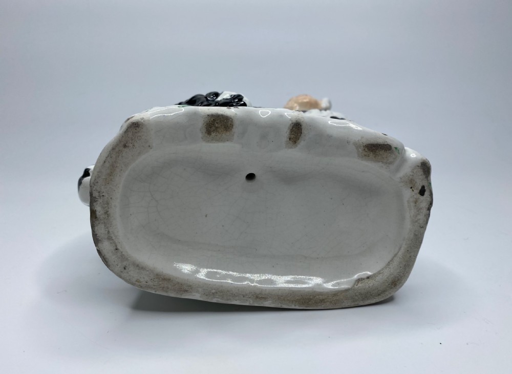 Pair Staffordshire Pipe Smoking dogs, c. 1850. View XIII