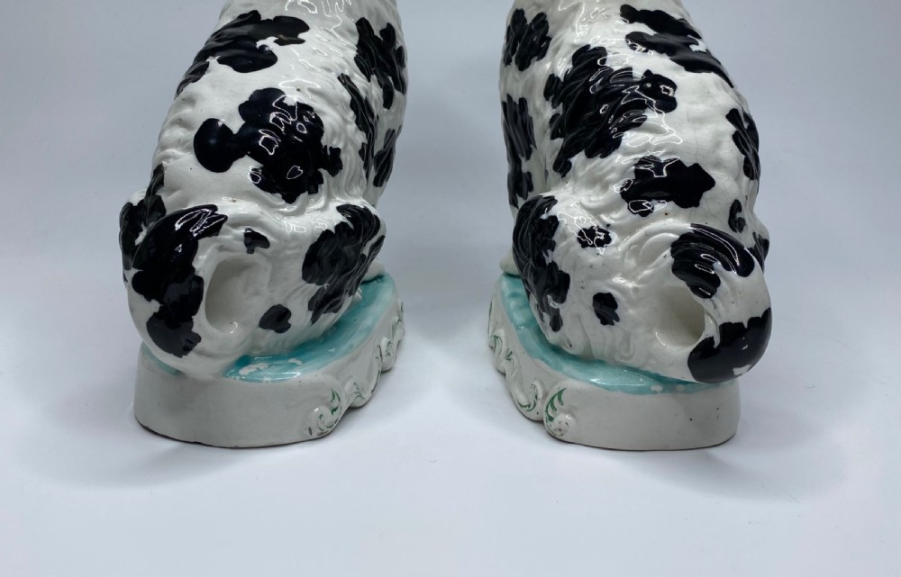 Pair Staffordshire Pipe Smoking dogs, c. 1850. View XV