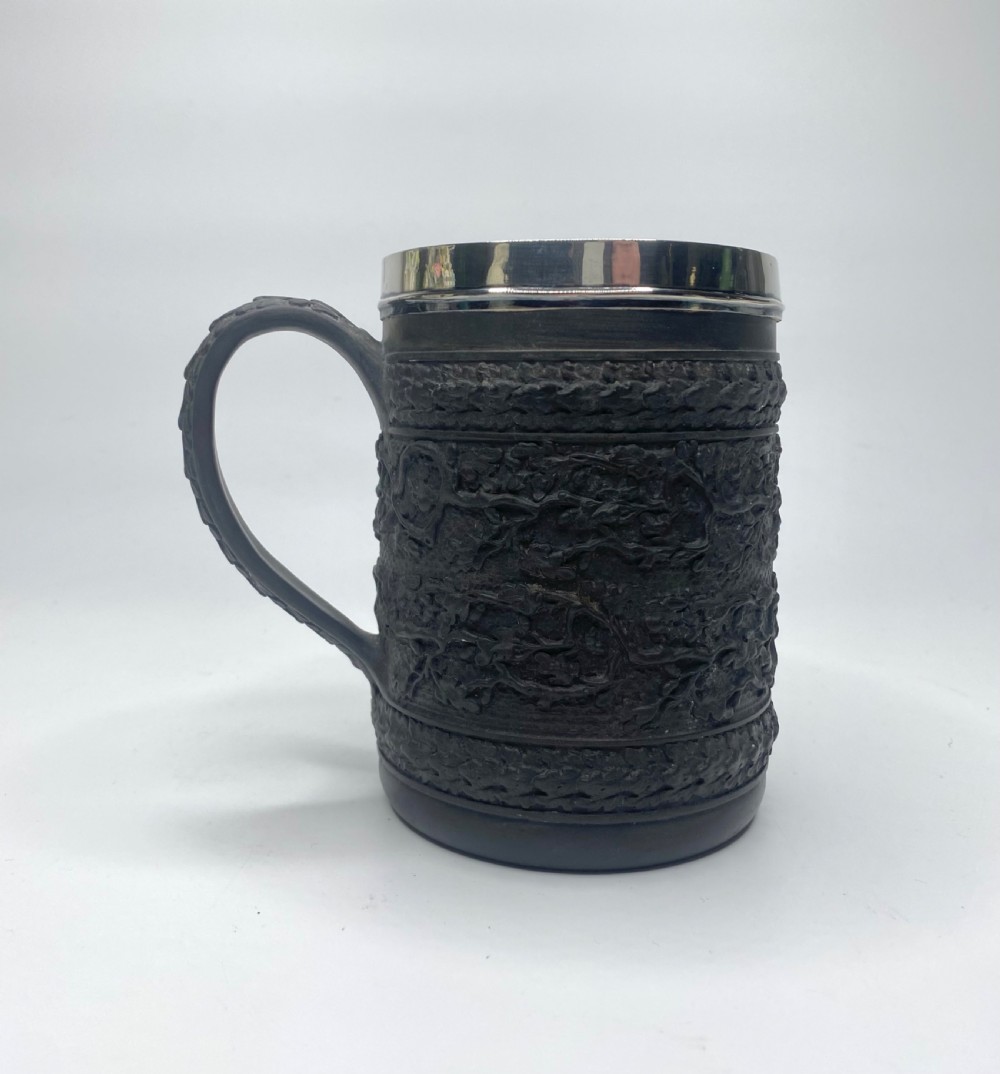 Wedgwood black basalt mug, silver mounted, d. 1808.