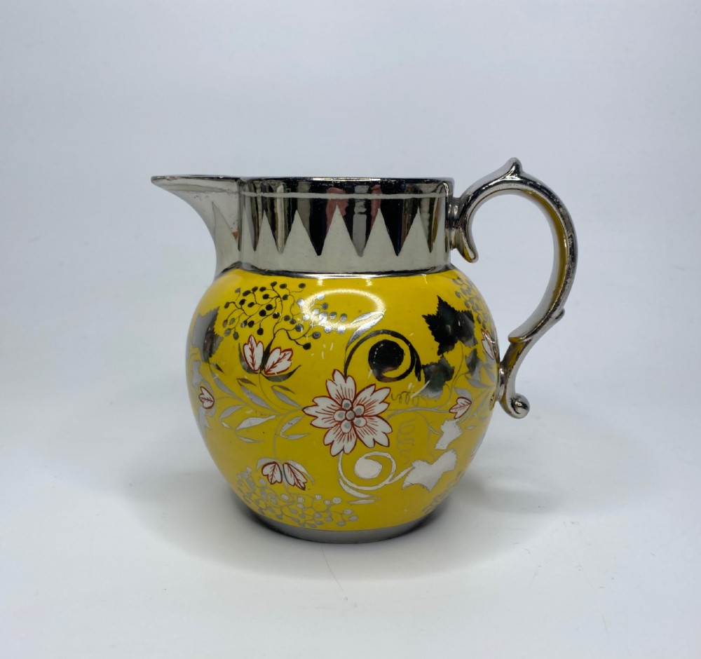 English pottery Canary Yellow silver lustre jug, c. 1820.