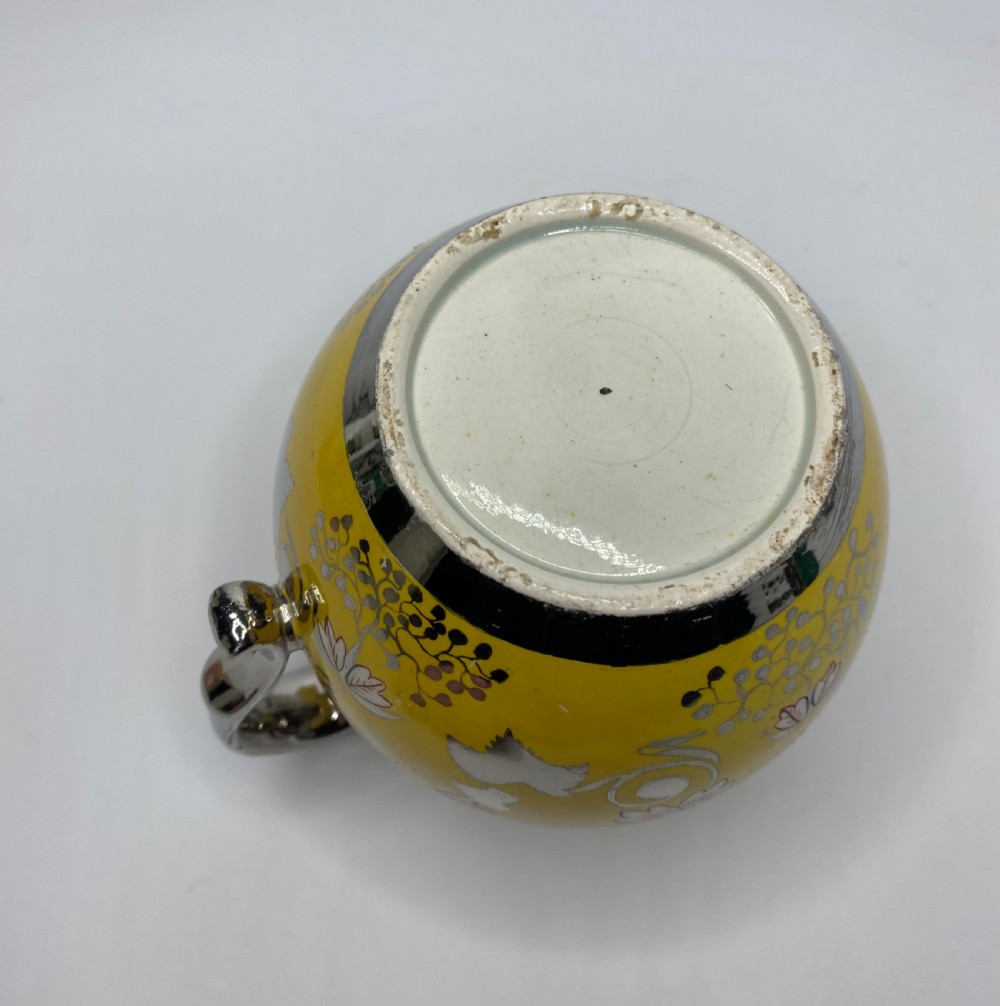 English pottery Canary Yellow silver lustre jug, c. 1820. View X