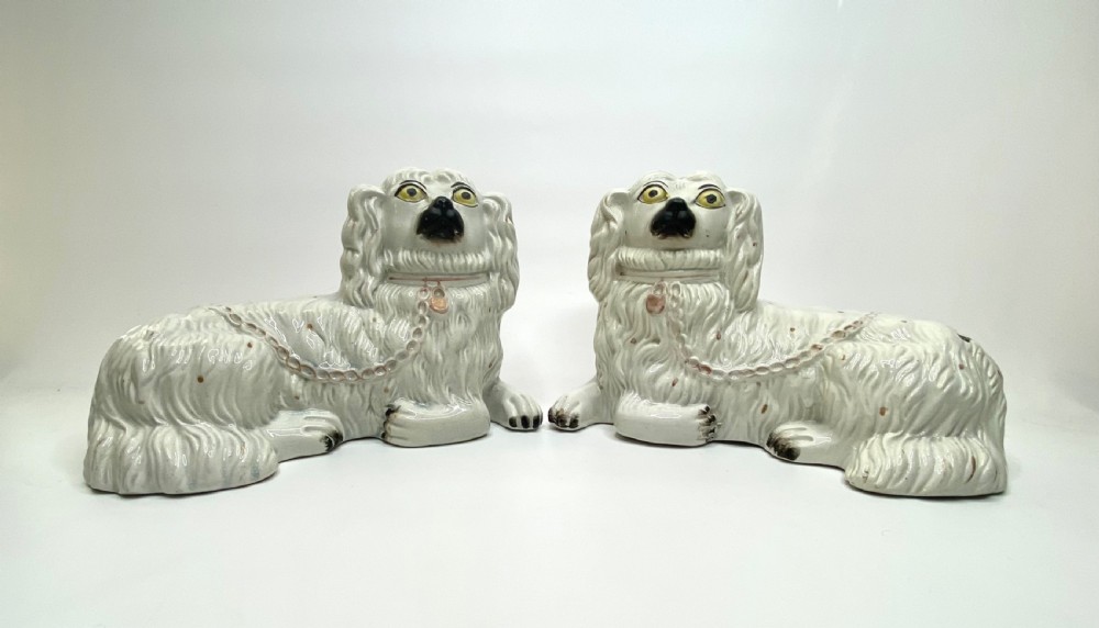 Rare pair of Staffordshire Spaniels, c. 1850.