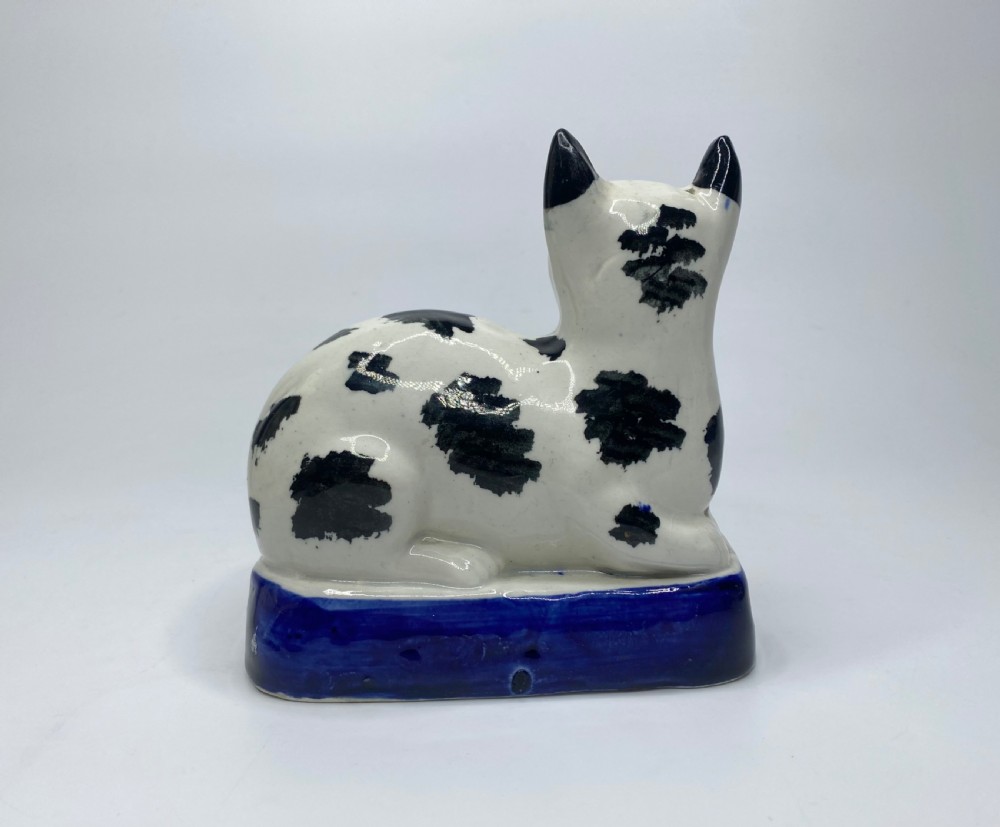 Staffordshire pottery recumbent cat, c. 1850. View III