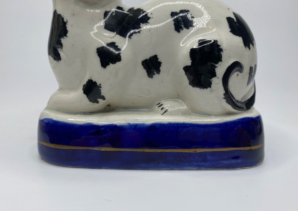 Staffordshire pottery recumbent cat, c. 1850. View VI
