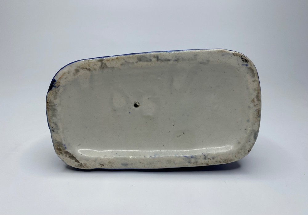 Staffordshire pottery recumbent cat, c. 1850. View VII