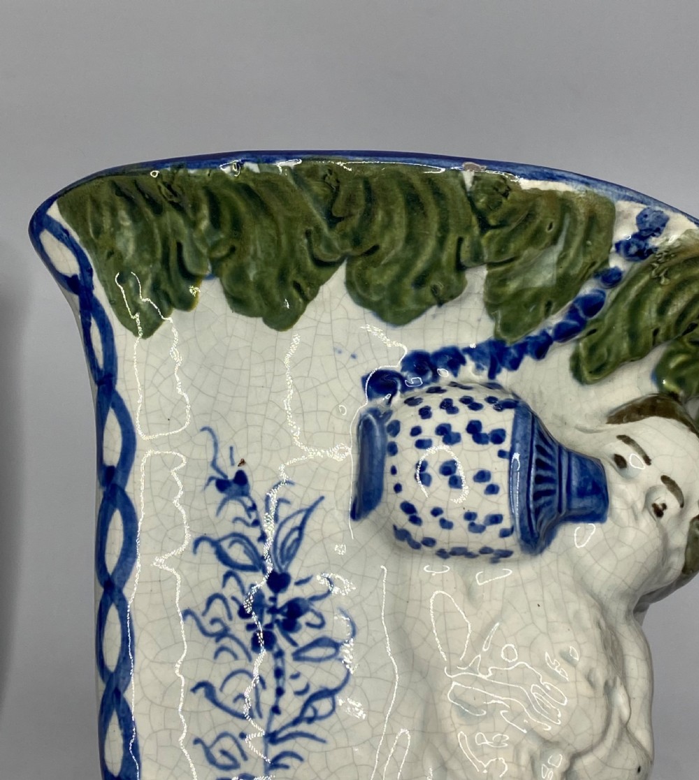 Pair Prestonpans, Prattware Cupid wall pockets, c. 1810. View VII