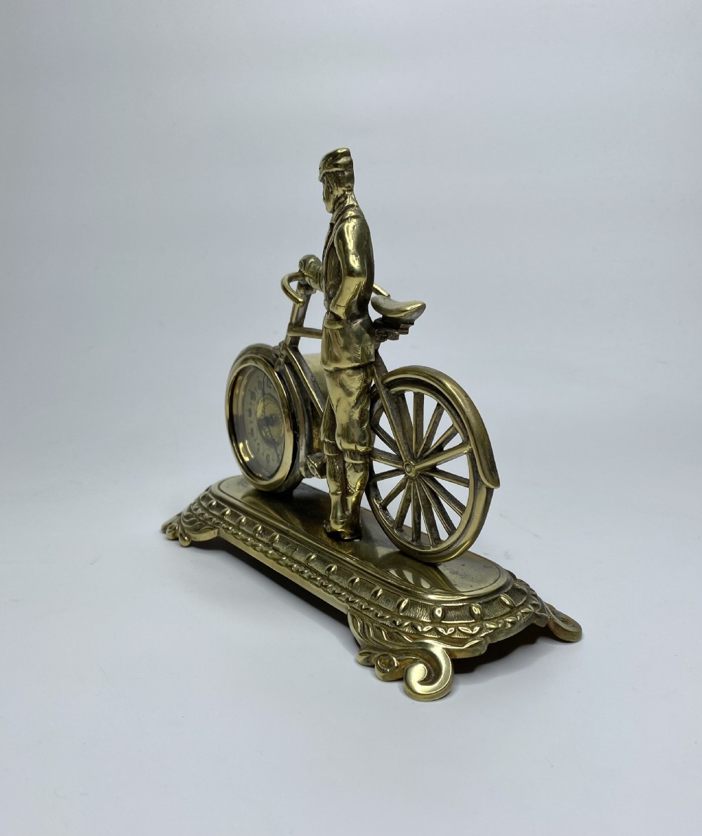 Brass cyclist and bicycle clock, England, c. 1910. View VI