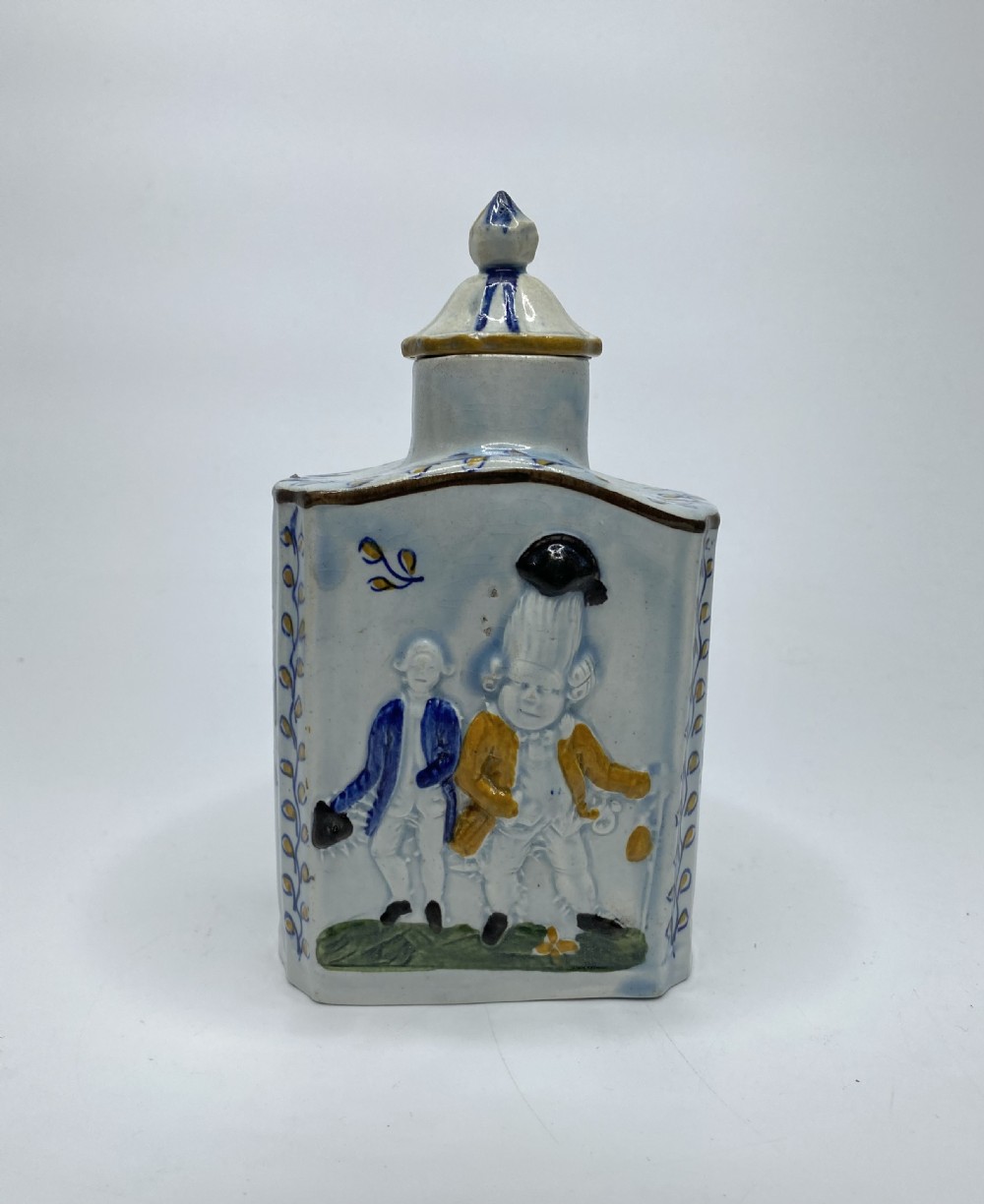 Prattware pottery ‘Macaroni’ tea caddy & cover, c. 1800.