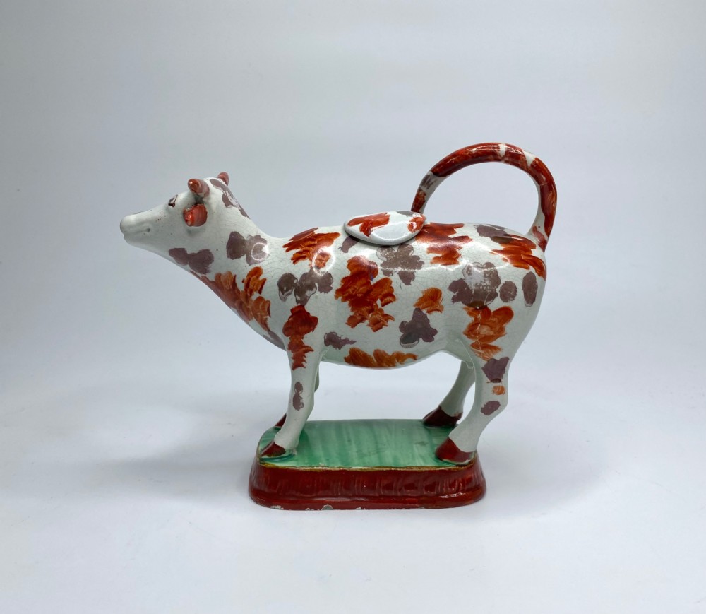 Staffordshire lustre pottery cow creamer, c. 1830. View IV