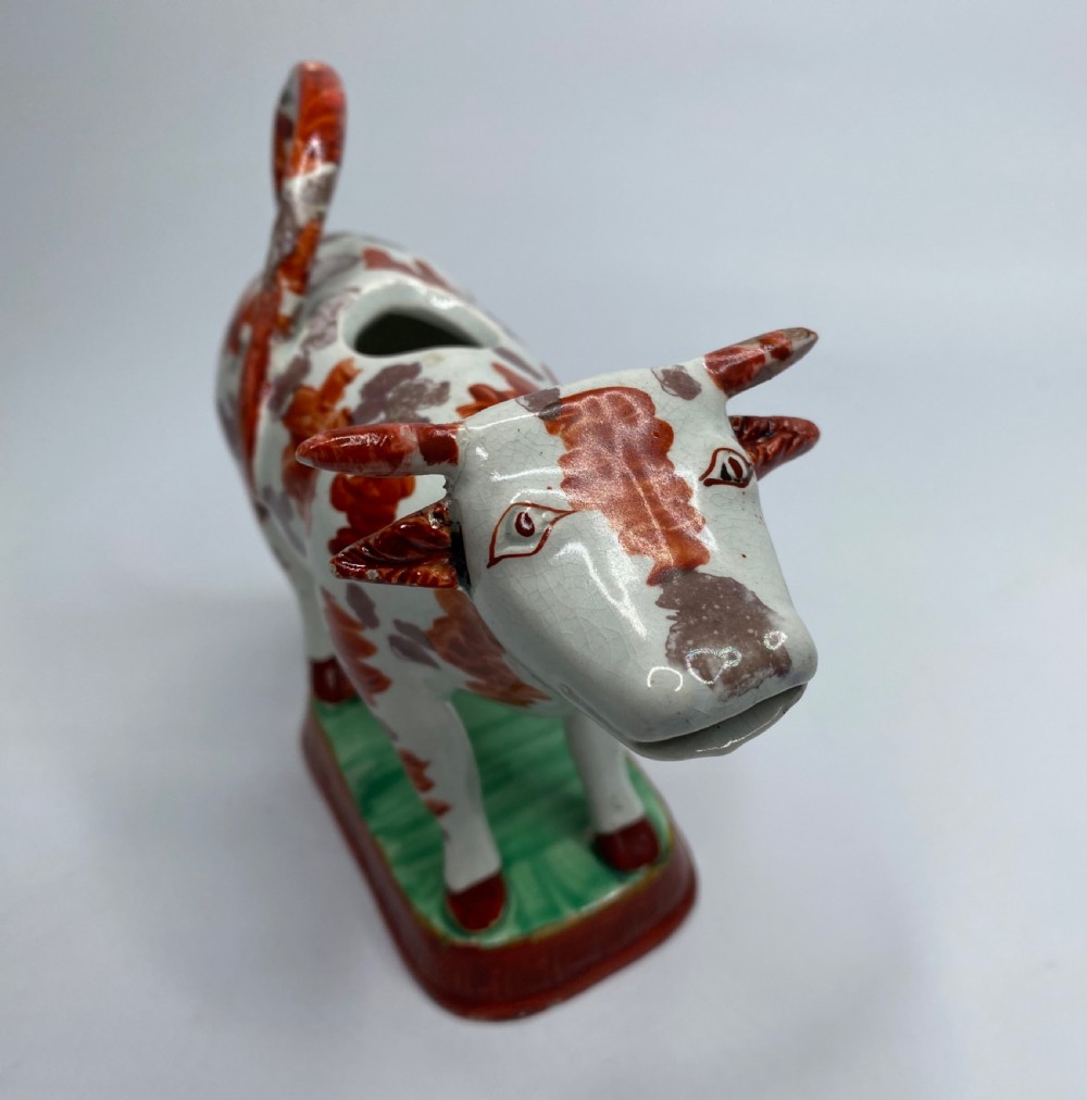 Staffordshire lustre pottery cow creamer, c. 1830. View VIII