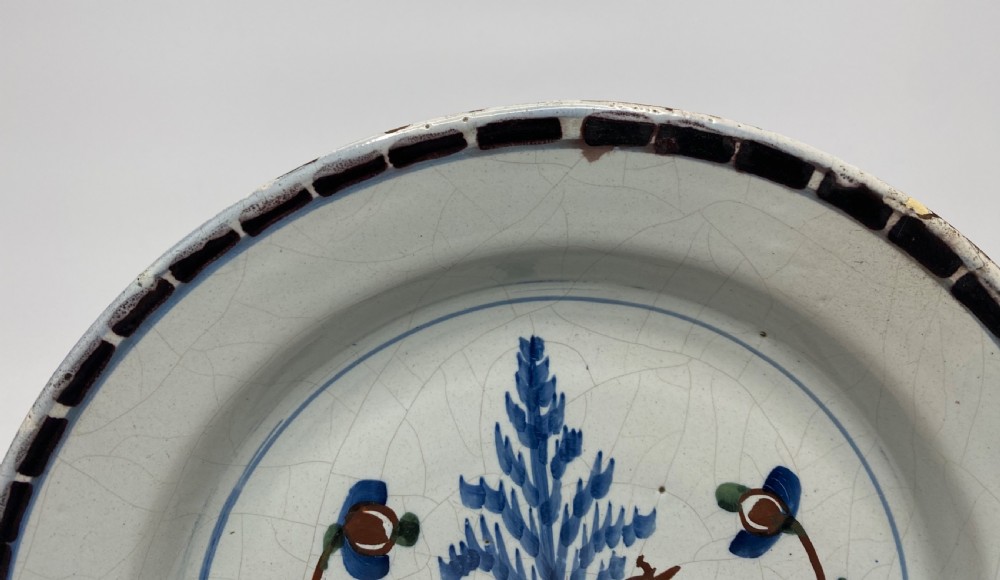Rare London Delft pancake plate, Long tailed bird, c. 1750. View III