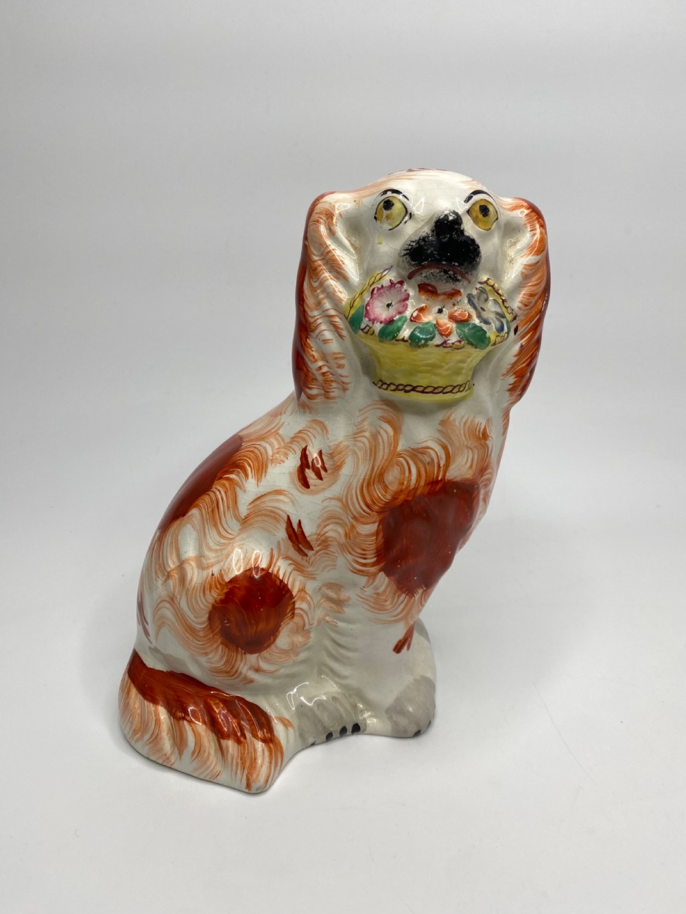 Pair Staffordshire ‘Basket of Flower’ Spaniels, c. 1860. View II