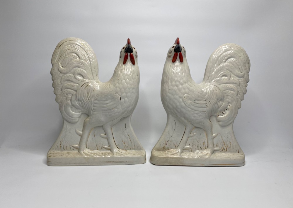 Pair of Staffordshire pottery cockerels, c. 1870.
