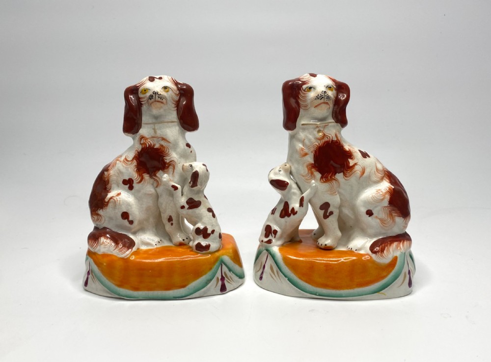 Pair Staffordshire Spaniels with puppies, c. 1850.