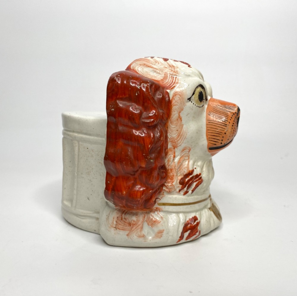 Pair of Staffordshire Spaniel window rests, c. 1850. View VI