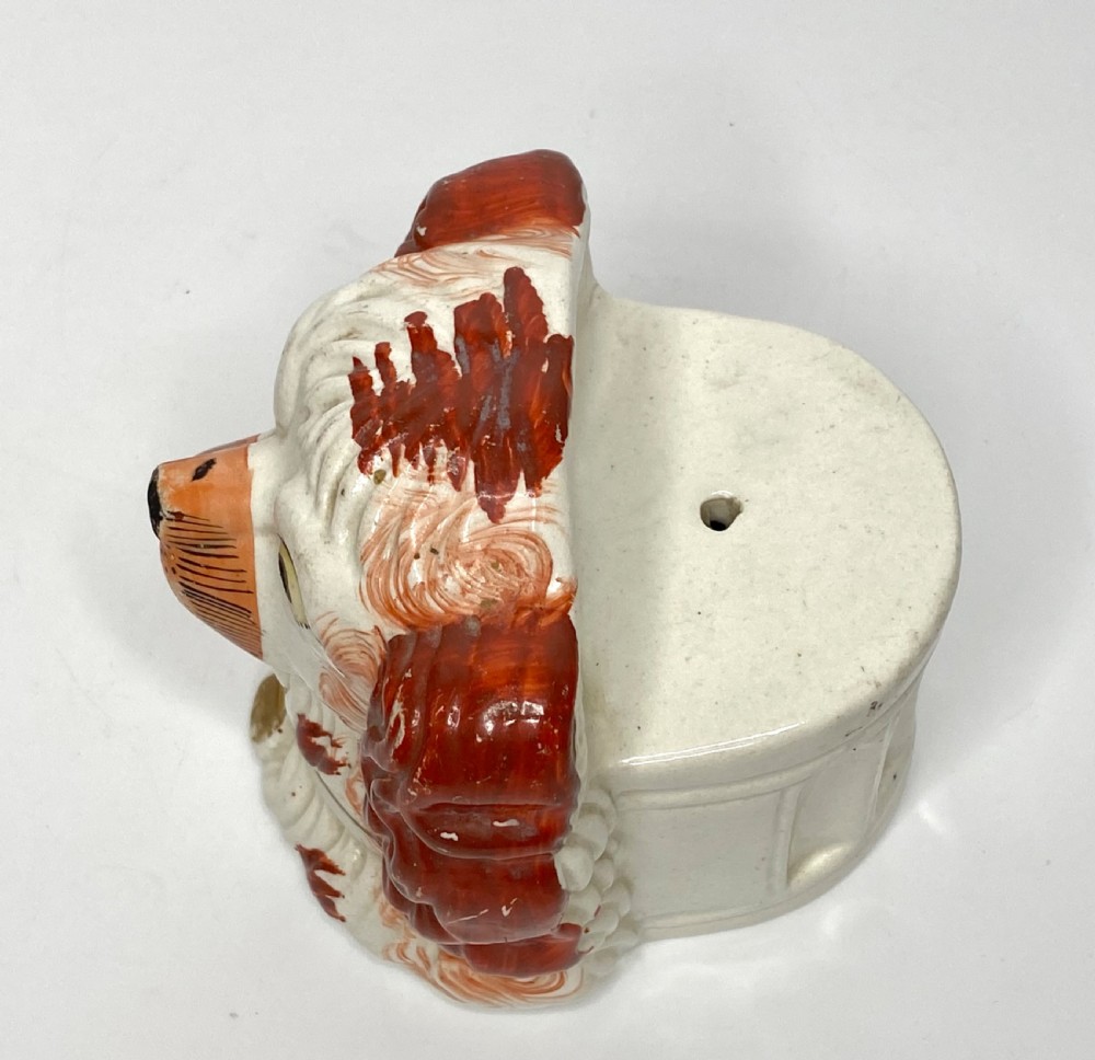 Pair of Staffordshire Spaniel window rests, c. 1850. View IX