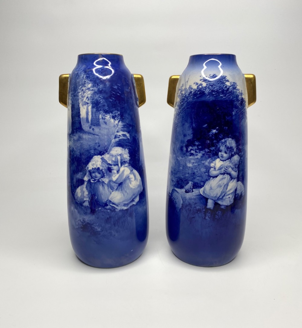 Pair Royal Doulton Blue Children vases, c. 1900.