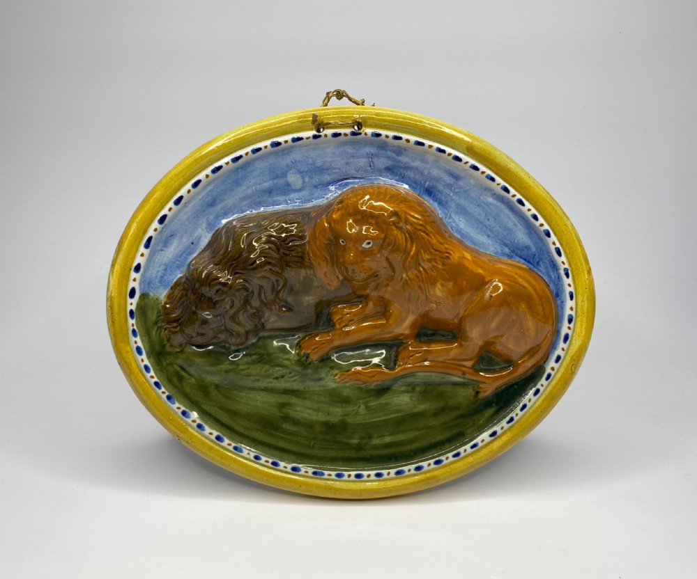 Prattware pottery ‘Lions’ plaque, c. 1810. Staffordshire.