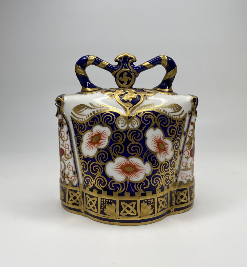 Royal Crown Derby cow bell, dated 1898.