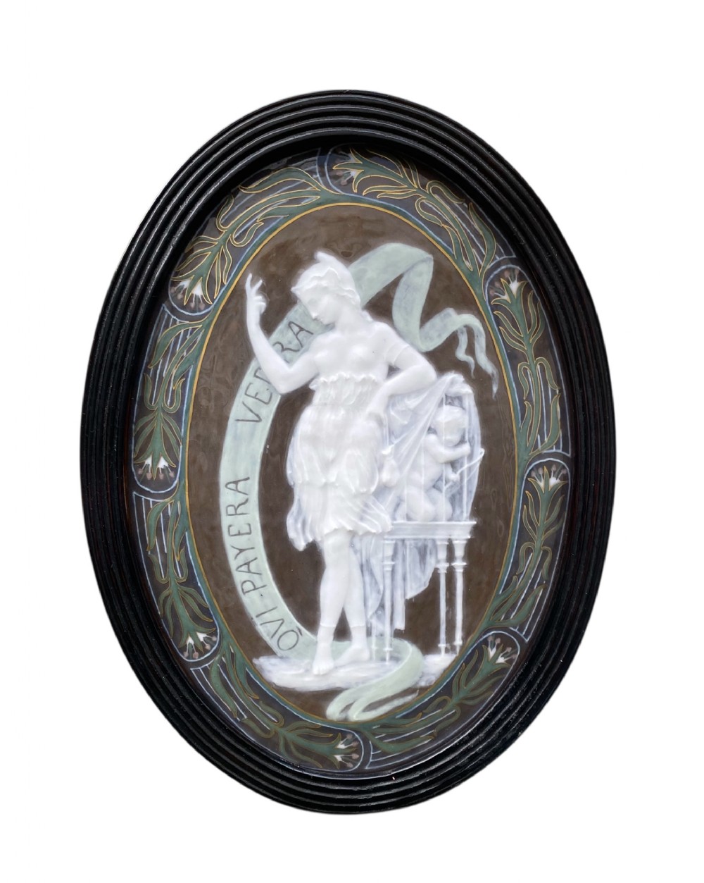 English pate sur pate plaque, Liberty revealing Cupid, c. 1870.