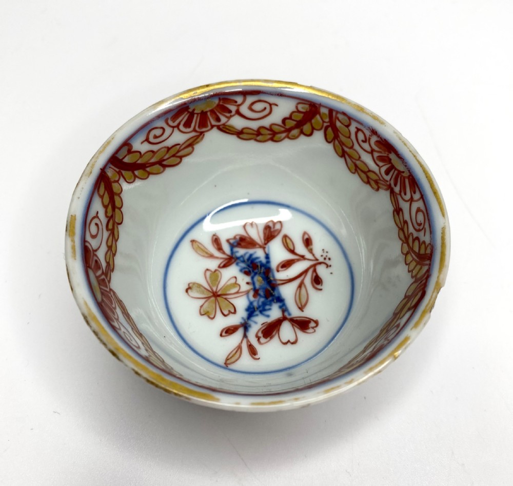 An 18th-century Chinese export porcelain tea bowl and saucer with red, gold, and blue Amsterdams Bont enamel decoration. View IX