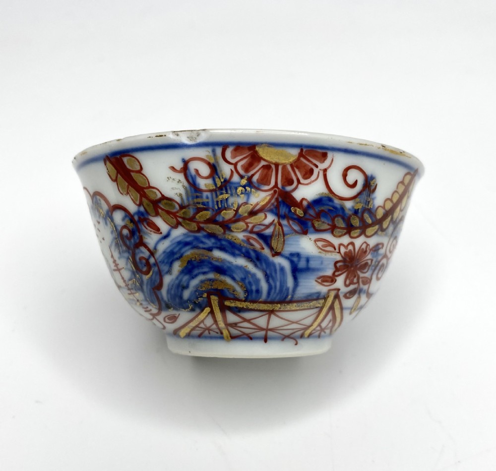 An 18th-century Chinese export porcelain tea bowl and saucer with red, gold, and blue Amsterdams Bont enamel decoration. View X