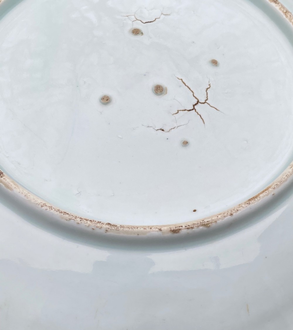 An eighteenth-century lobed Arita porcelain dish decorated with five flying cranes in cobalt blue underglaze against a white background. View VII