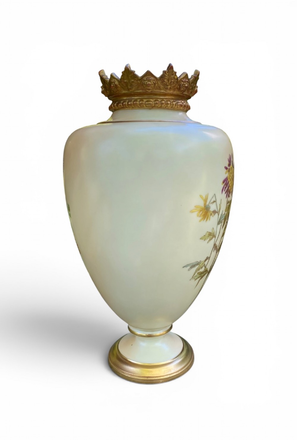 An urn-shaped ivory porcelain vase featuring hand-painted botanical chrysanthemum flowers, an ornate pierced crown rim, and gilded accents. View III