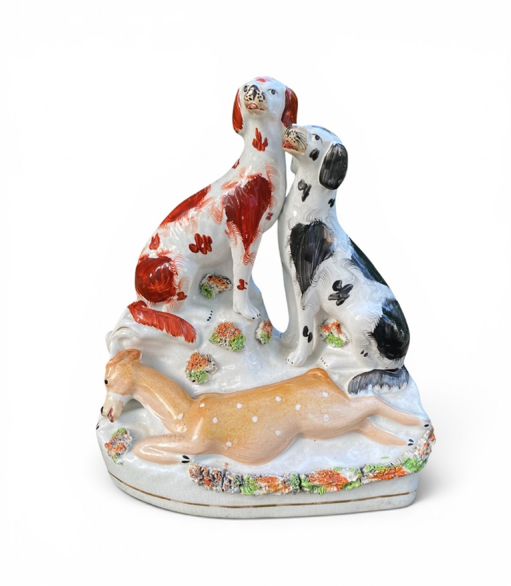 Staffordshire pottery hunting hounds group, c. 1850.