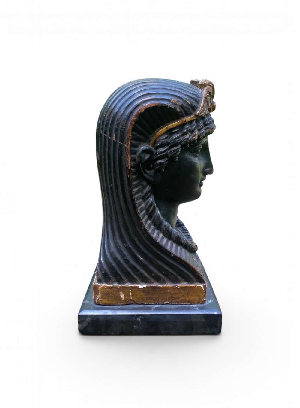 A facing pair of carved dark wood sphinx busts with gilt highlights mounted on rectangular black marble bases. View IV