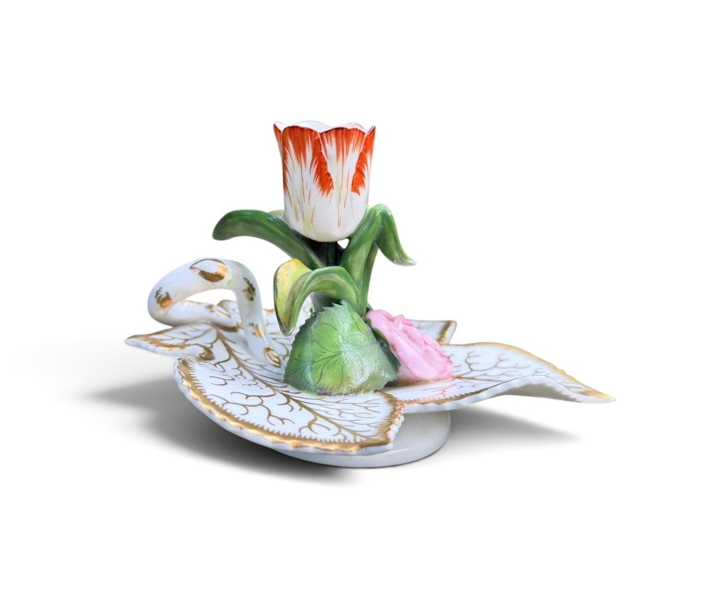 An English porcelain chamberstick designed as a leaf base with a central tulip-shaped candle sconce hand-painted in red, green, pink, and gold. View IV