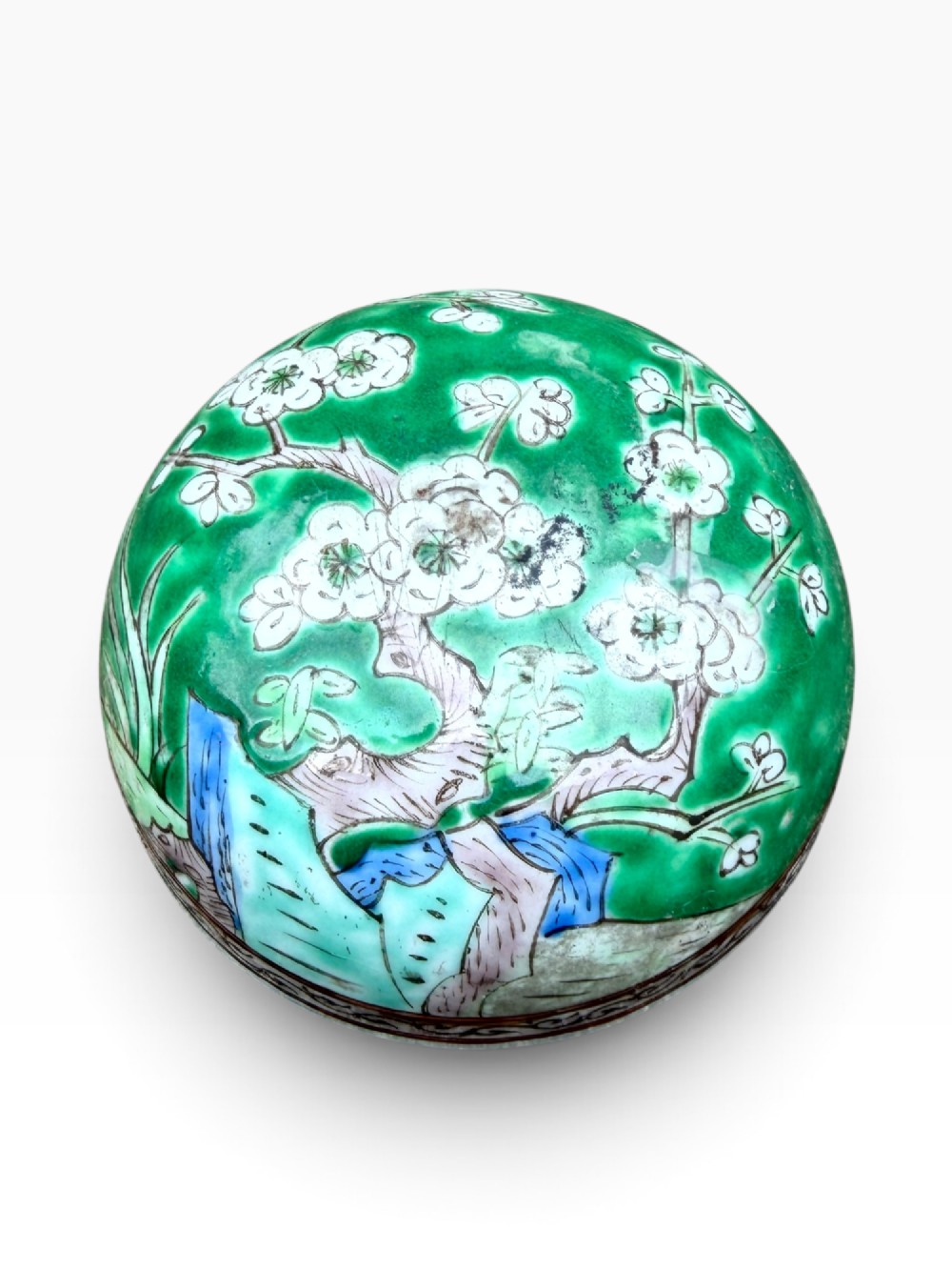 A 19th-century Chinese porcelain ginger jar with a matching domed cover, decorated with hand-painted birds and white blossoms on a green background. View X