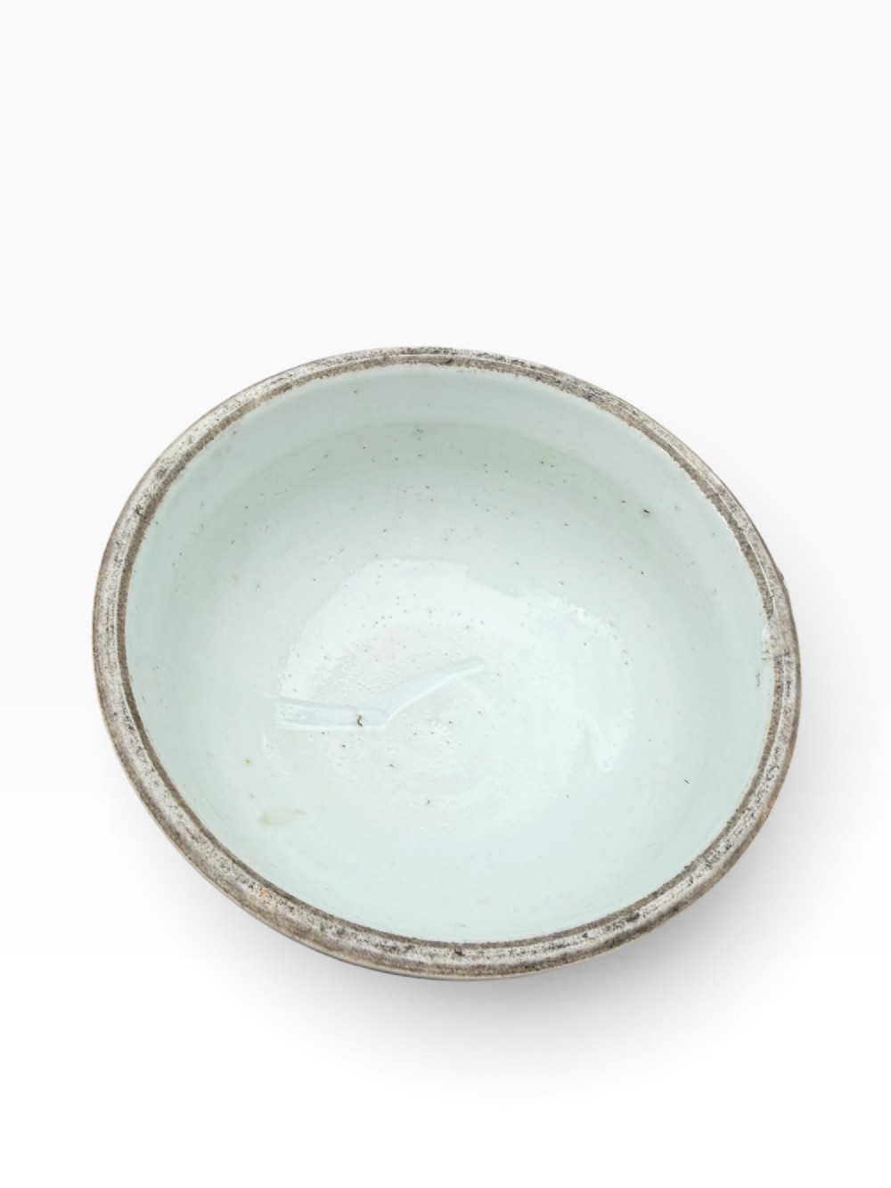 A 19th-century Chinese porcelain ginger jar with a matching domed cover, decorated with hand-painted birds and white blossoms on a green background. View XI