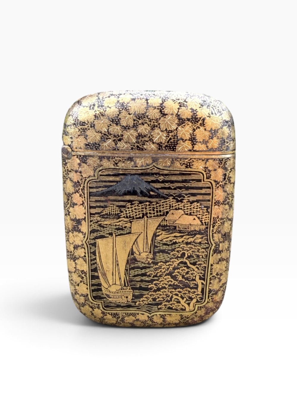 An antique Japanese Meiji period rectangular vesta case with rounded corners, featuring detailed gold damascene peacock and flora inlay on a dark iron surface. View II