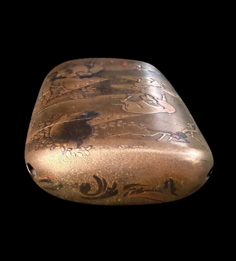 A multi-tiered Japanese gold maki-e lacquer inro featuring detailed relief depictions of zodiac animals including an ox, rabbit, rat, snake, and tiger. View X