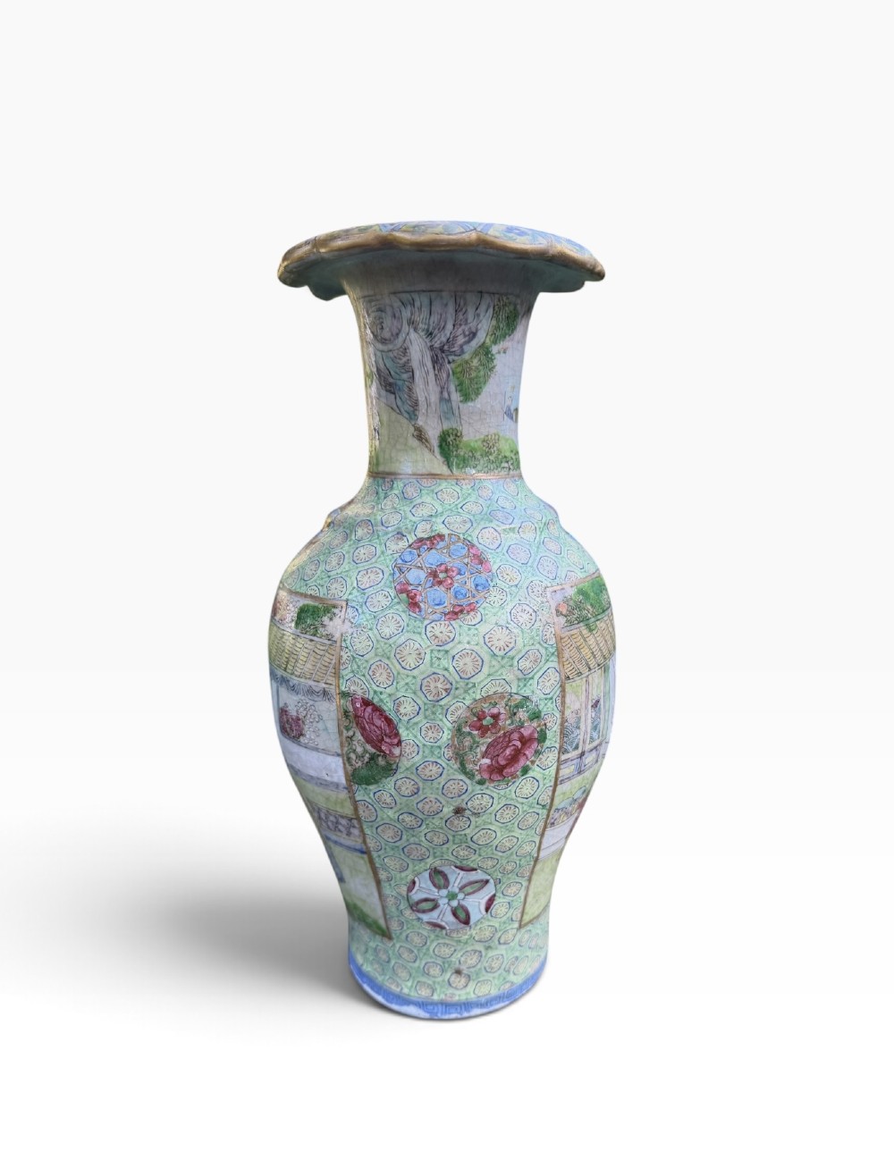 A pair of 19th-century Chinese Yixing stoneware baluster vases decorated in vibrant polychrome enamels with figural panels on a patterned green ground. View VII