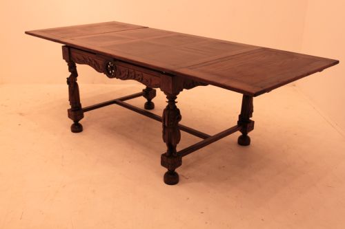 A Highly Unusual French Oak Draw Leaf Dining Table